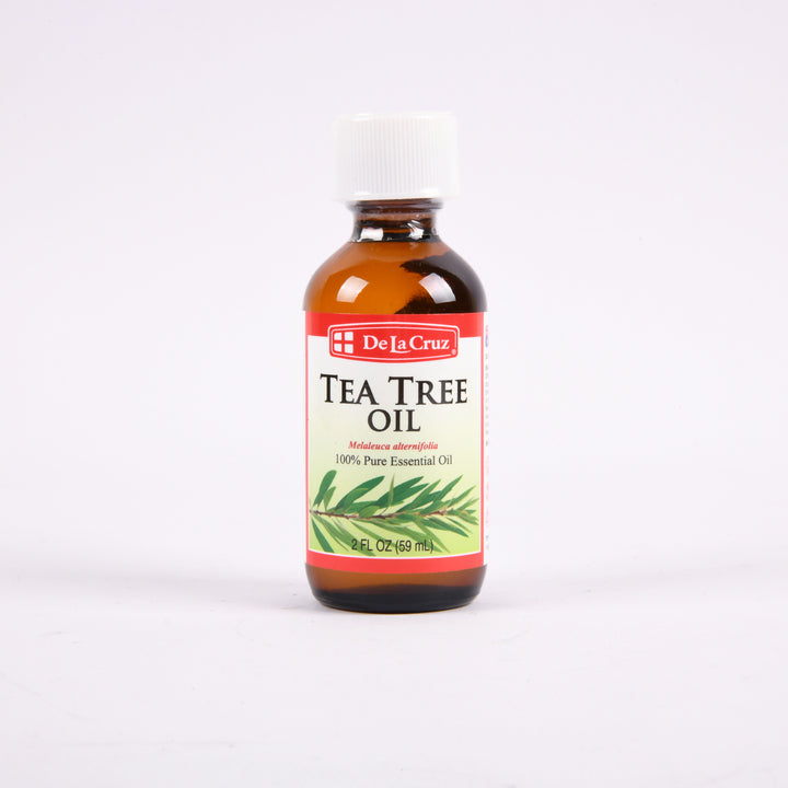 De La Cruz Pure Tea Tree Oil 2oz bottle 100 percent essential oil for skin and aromatherapy