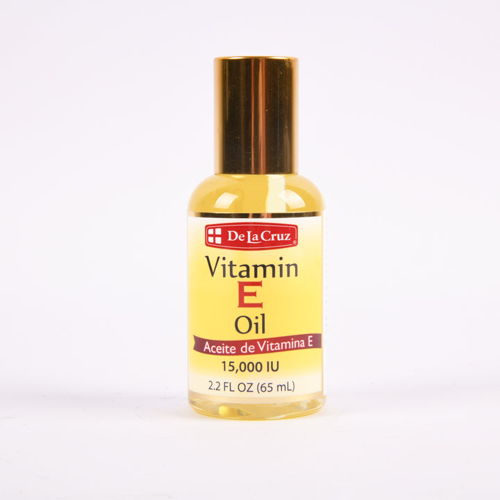 De La Cruz Vitamin E Oil 2oz bottle 15000 IU moisturizing skin oil for hydration and softness
